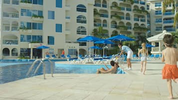 Outdoor pool, pool umbrellas, pool loungers