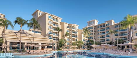 Outdoor pool, open 8:00 AM to 8:00 PM, pool umbrellas, pool loungers