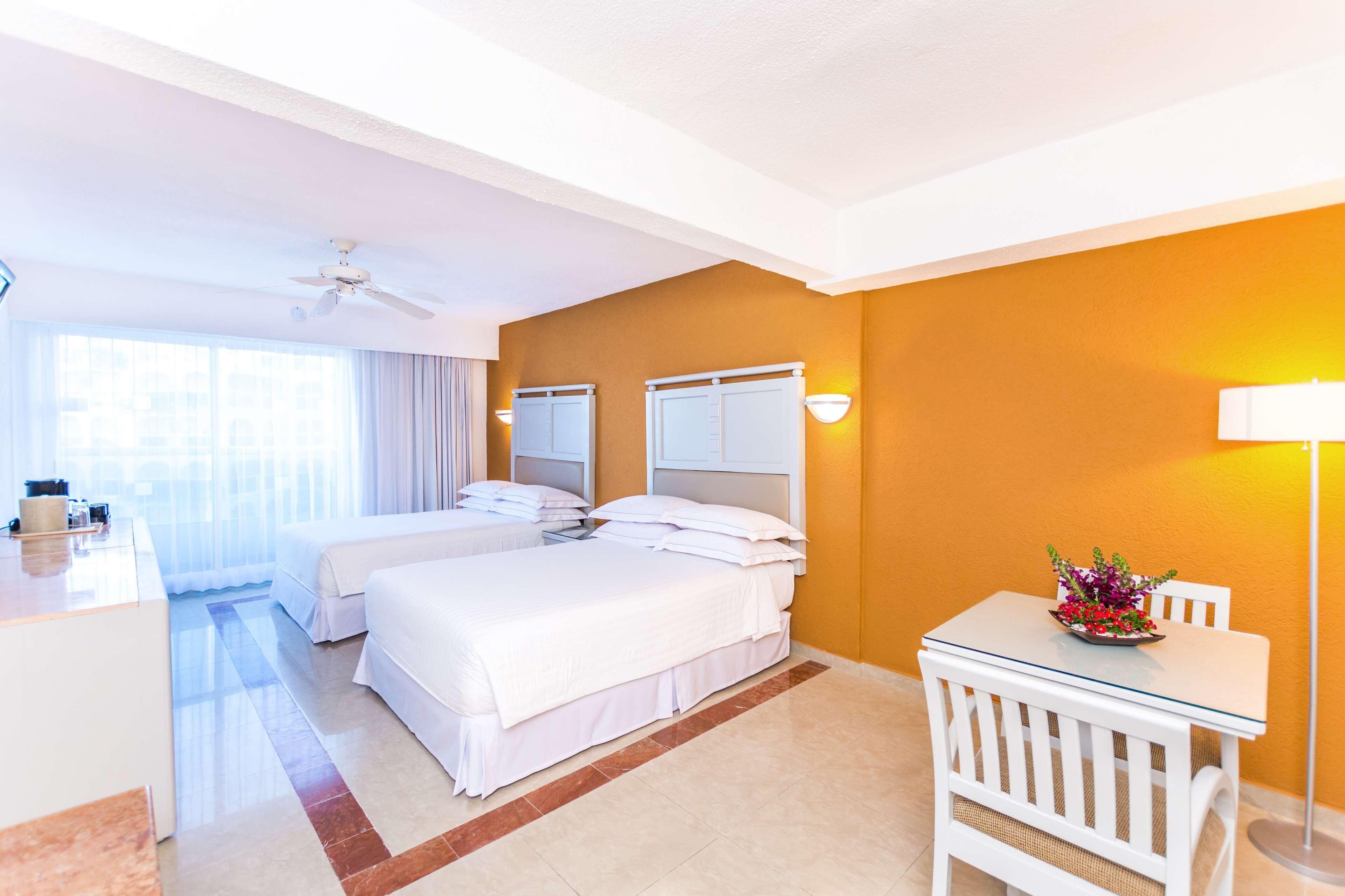 Free minibar, in-room safe, blackout curtains, iron/ironing board
