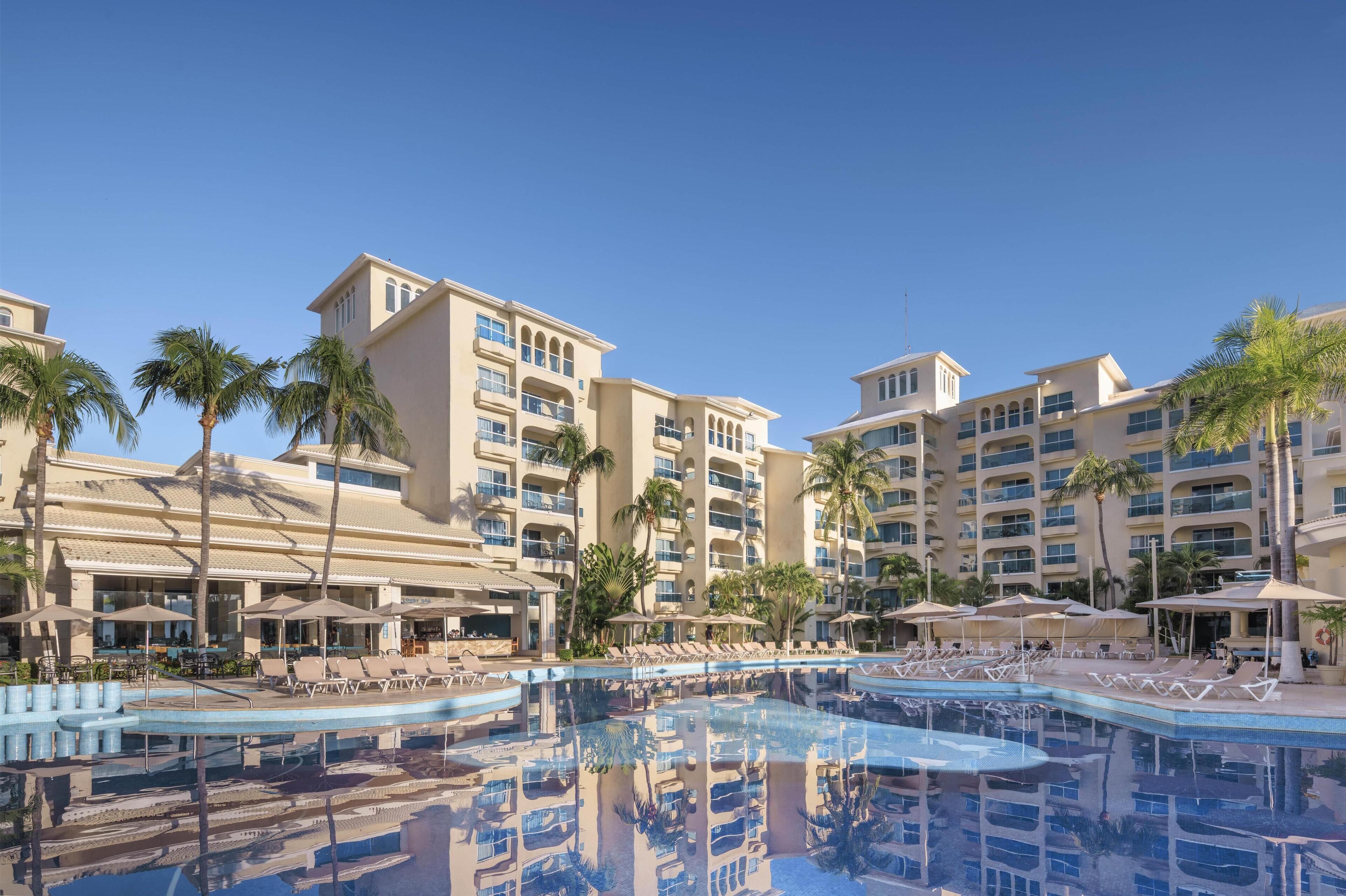 Outdoor pool, open 8:00 AM to 8:00 PM, pool umbrellas, sun loungers