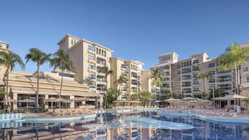 Outdoor pool, open 8:00 AM to 8:00 PM, pool umbrellas, sun loungers