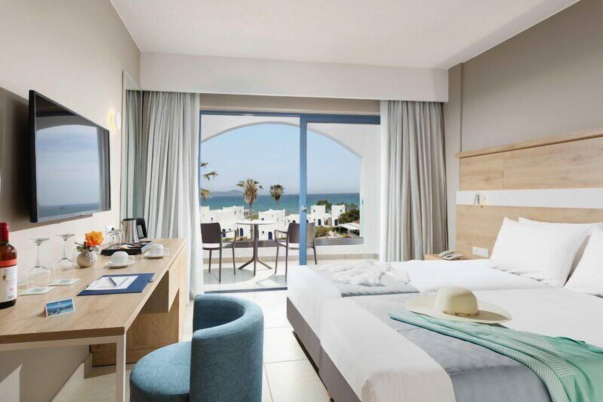 Standard Room, Sea View | In-room safe, desk, blackout curtains, free WiFi