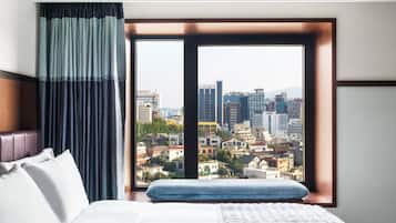 Ropa de cama de alta calidad y minibar
