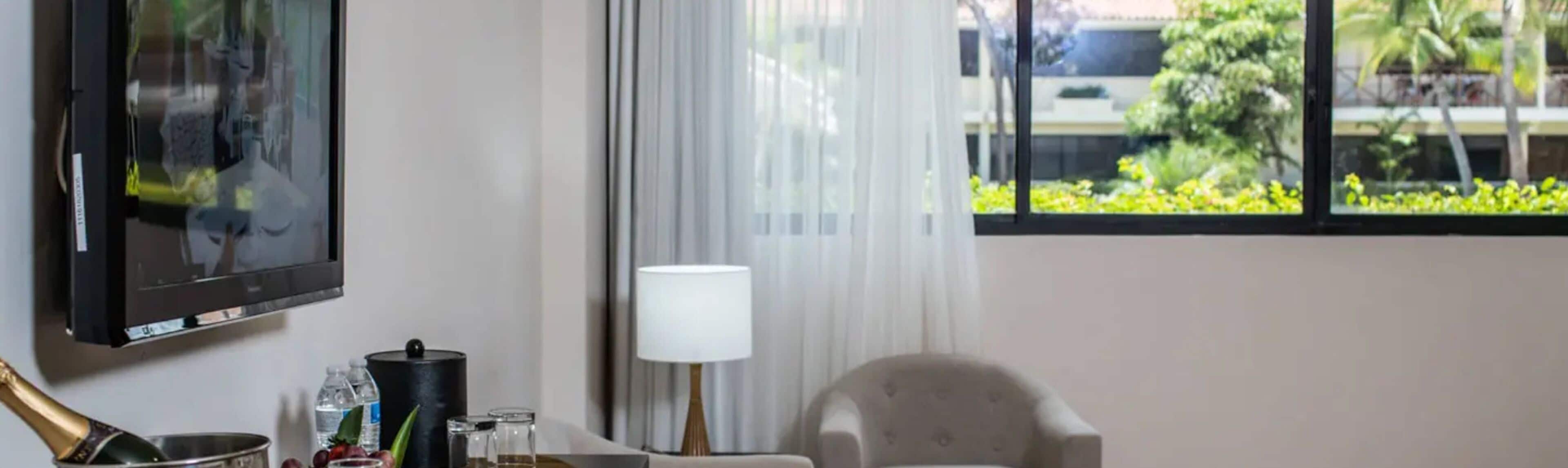 Pool view Suite, 2 Double Beds | View from room