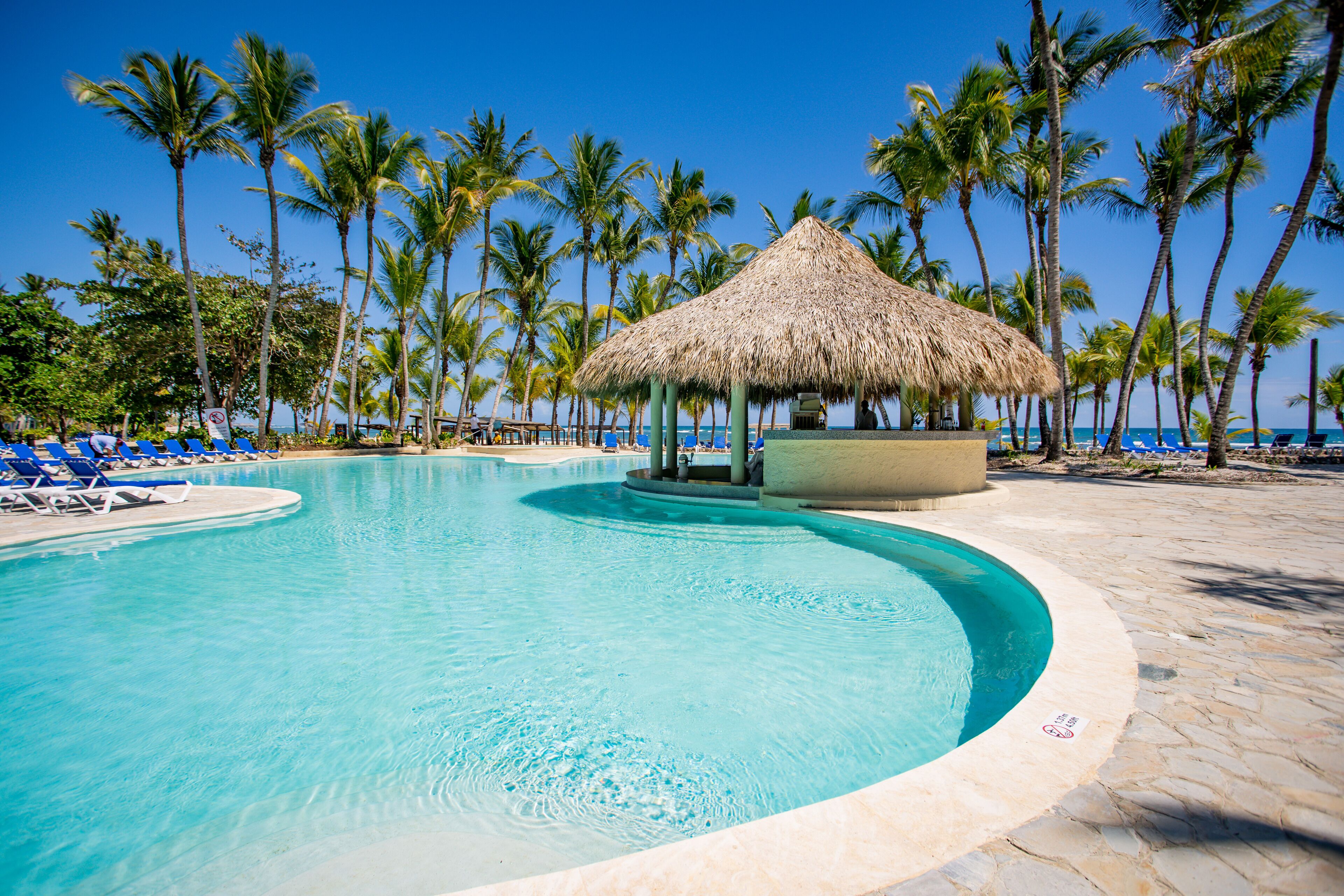 2 outdoor pools, open 7:00 AM to 7:00 PM, pool umbrellas, sun loungers