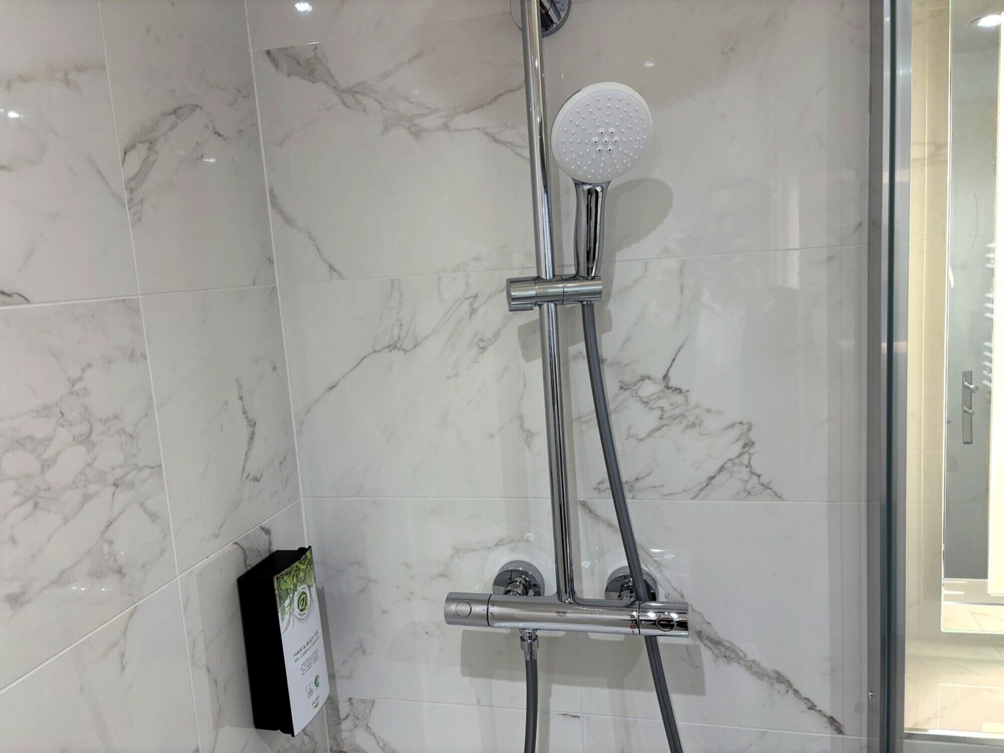 shower, rainfall showerhead, eco-friendly toiletries, hair dryer