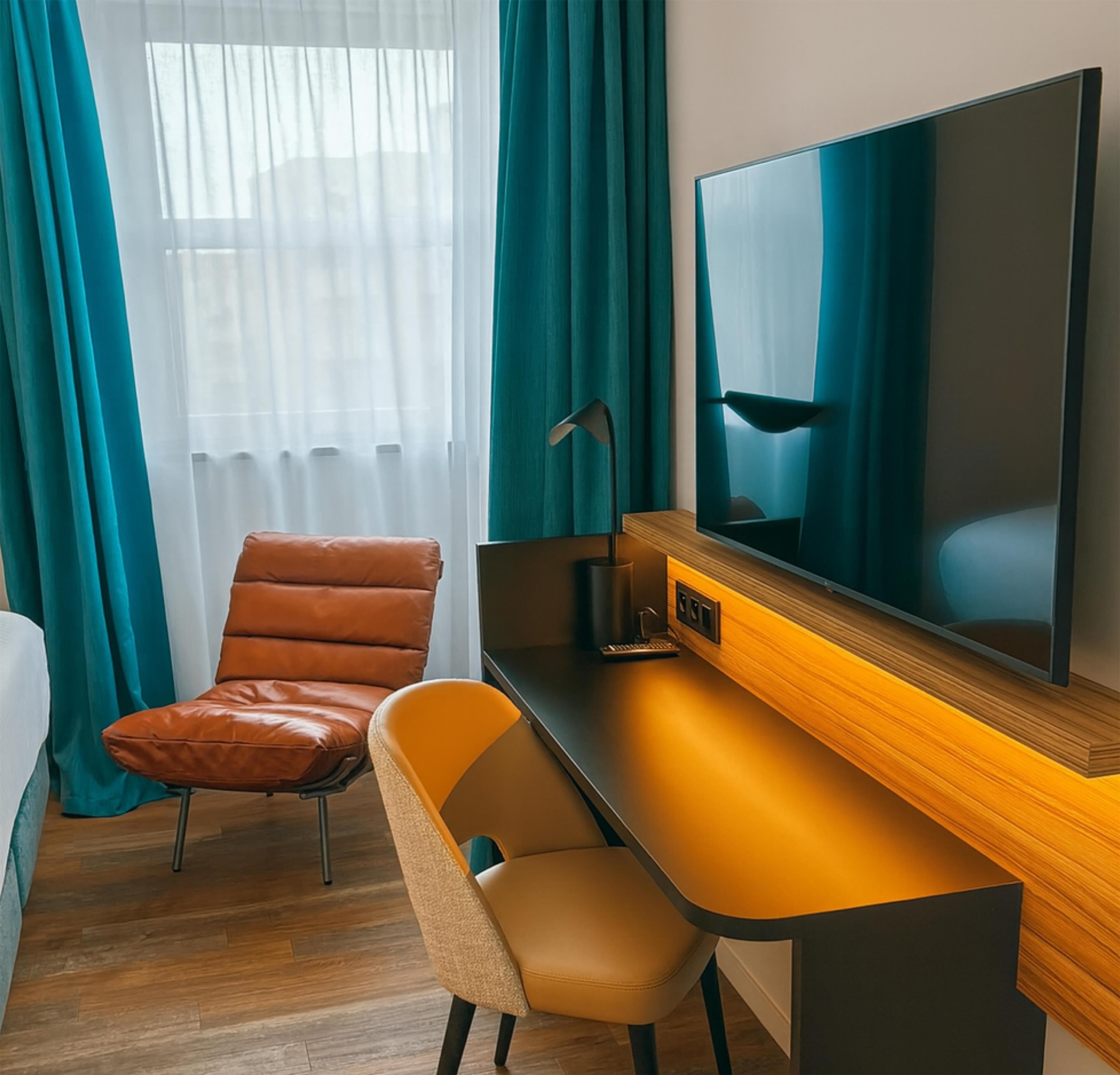 Luxe beddengoed, een kluis op de kamer, individueel gemeubileerd