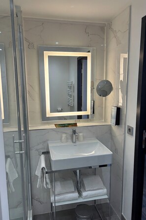 Shower, rainfall showerhead, eco-friendly toiletries, hair dryer