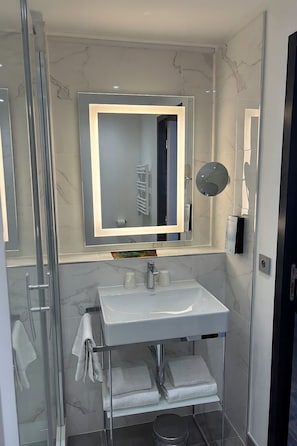 Shower, rainfall showerhead, eco-friendly toiletries, hair dryer