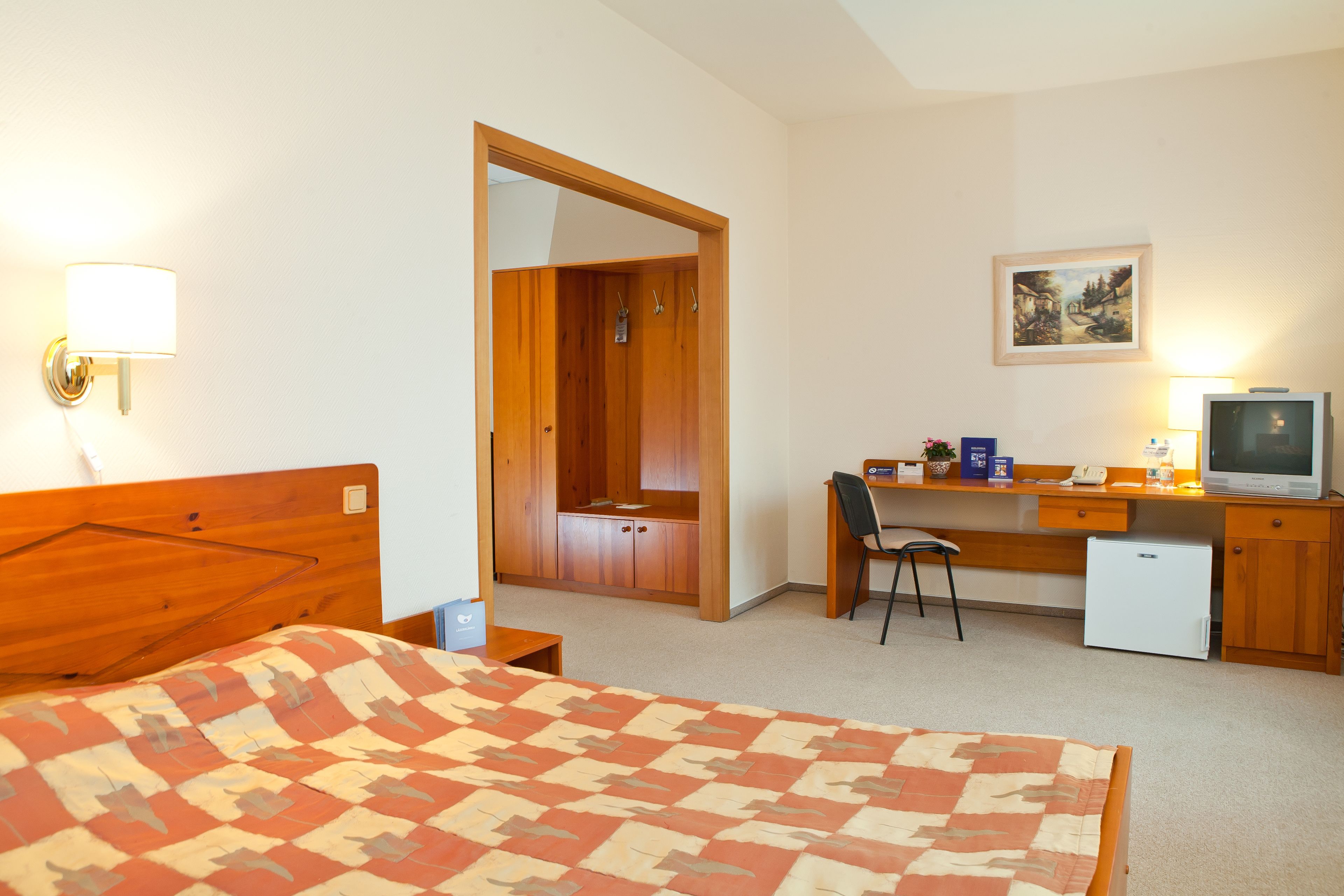 junior suite, 1 bedroom, hot tub | living area | lcd tv