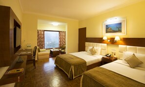 Deluxe Room | Frette Italian sheets, memory foam beds, in-room safe