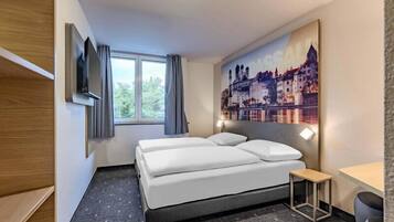 Habitación con 2 camas individuales | Escritorio, cortinas opacas, sistema de insonorización y wifi gratis