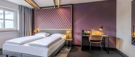 Desk, blackout drapes, soundproofing, free WiFi