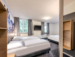 Desk, blackout drapes, soundproofing, free WiFi