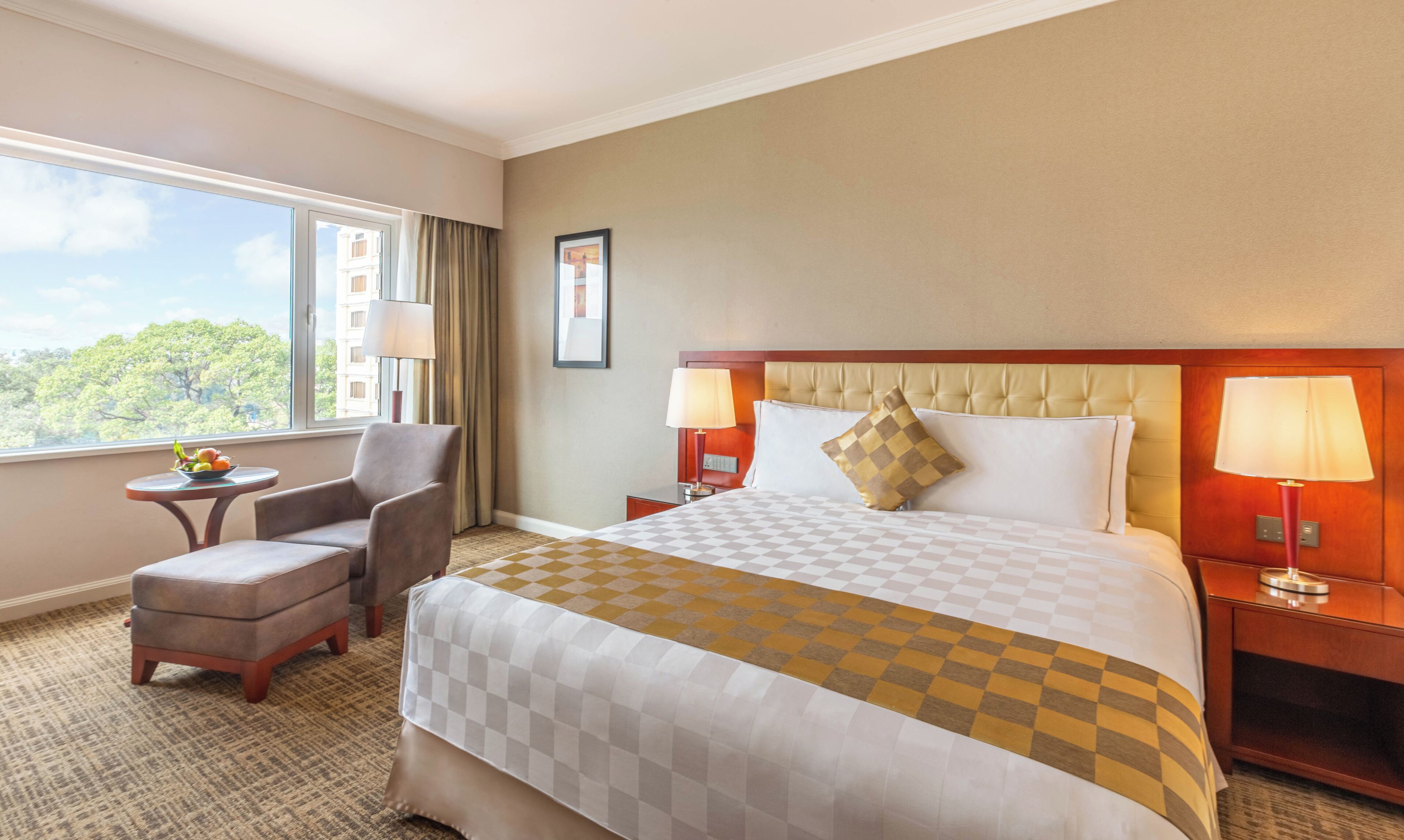 Deluxe Room, 1 King Bed | Minibar, in-room safe, individually furnished, desk
