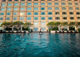 Outdoor pool, open 6:00 AM to 10:00 PM, pool umbrellas, pool loungers