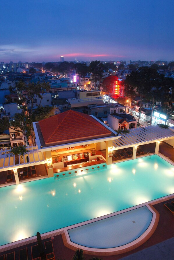 Outdoor pool, open 6:00 AM to 10:00 PM, pool umbrellas, pool loungers