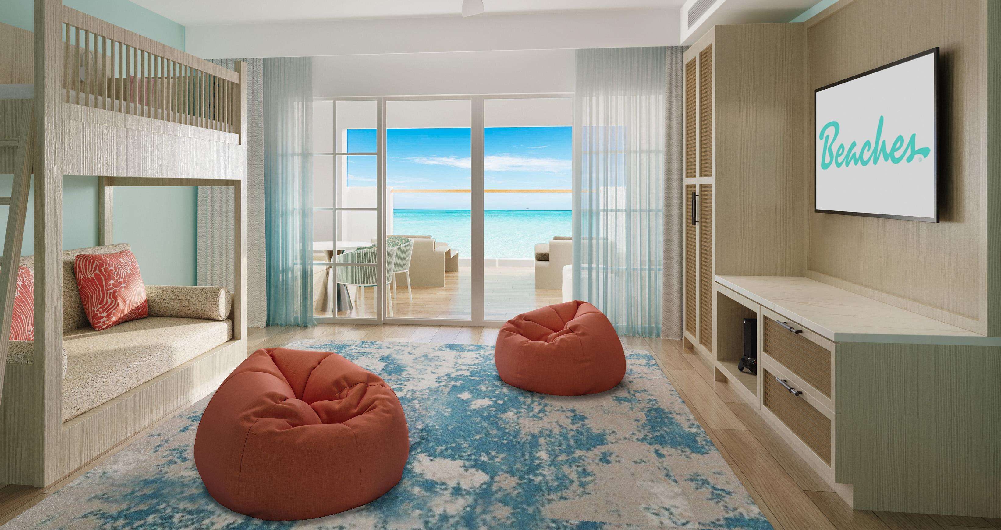 A modern living room with a view of the beach, a bunk bed, and a flat-screen TV on the wall.