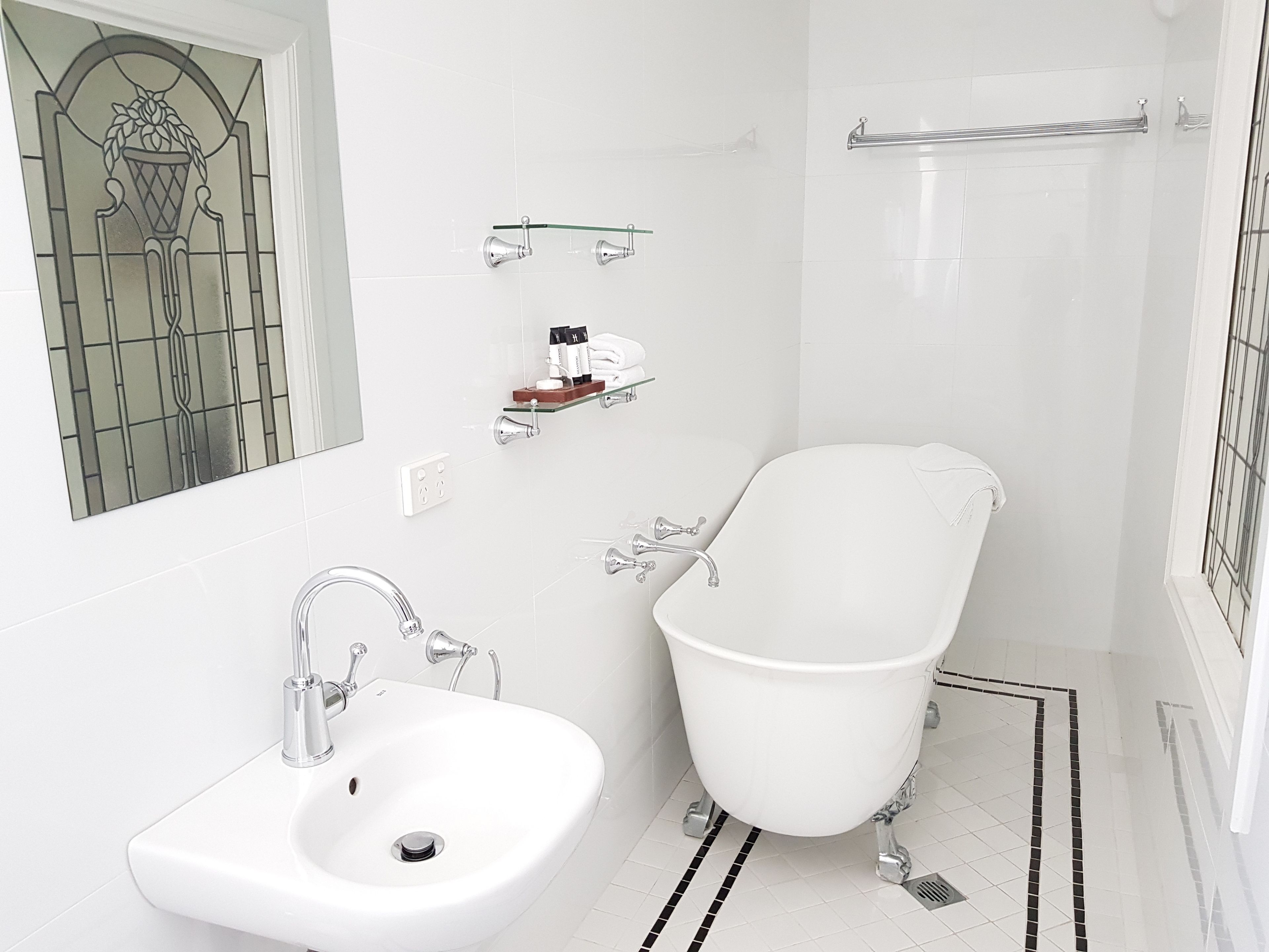 queen suite | bathroom | shower, designer toiletries, hair dryer, towels