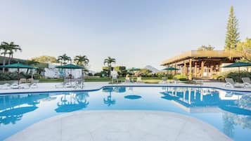 Outdoor pool, pool umbrellas, sun loungers