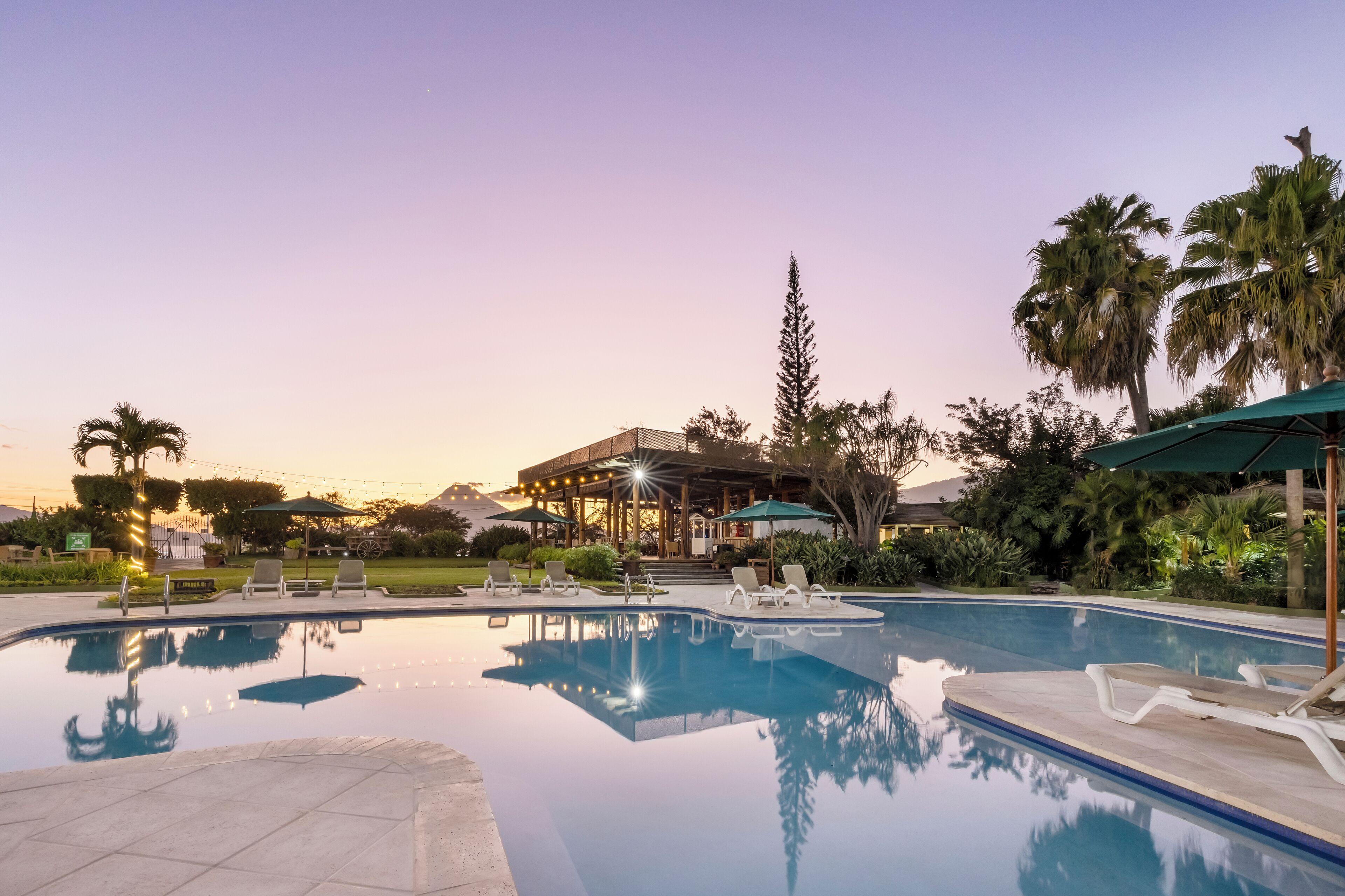 outdoor pool, pool umbrellas, pool loungers