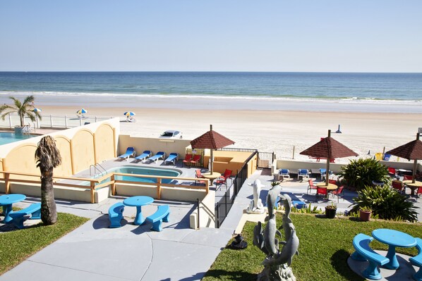 Na praia, toalhas de praia 
