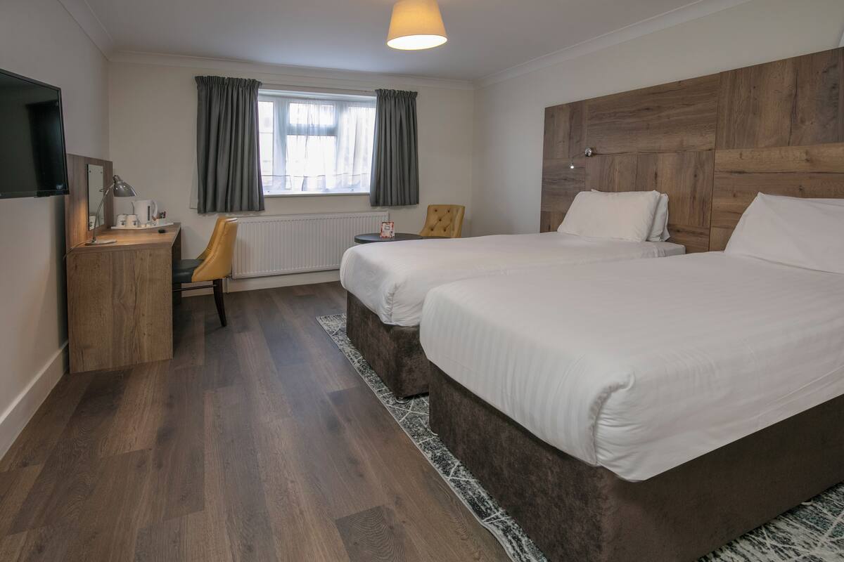 standard room, 2 single beds, non smoking | in-room safe, desk, laptop workspace, blackout curtains