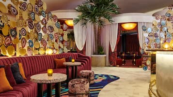 4 bars/lounges, poolside bar