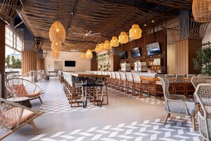 4 bars/lounges, poolside bar