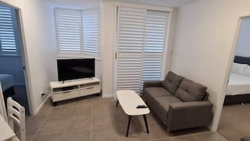 2 Bedroom Deluxe Apartment | Private kitchen | Full-sized fridge, microwave, oven, stovetop