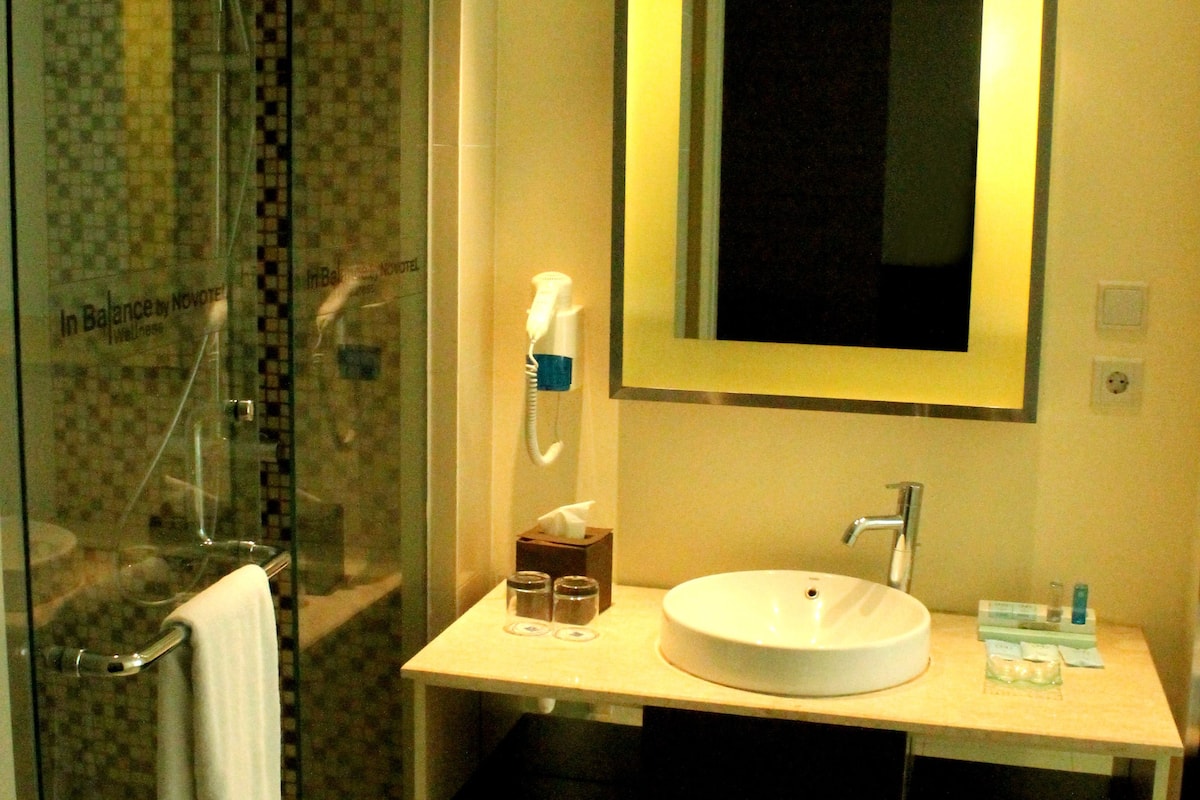 eco-friendly toiletries, slippers, bidet, towels