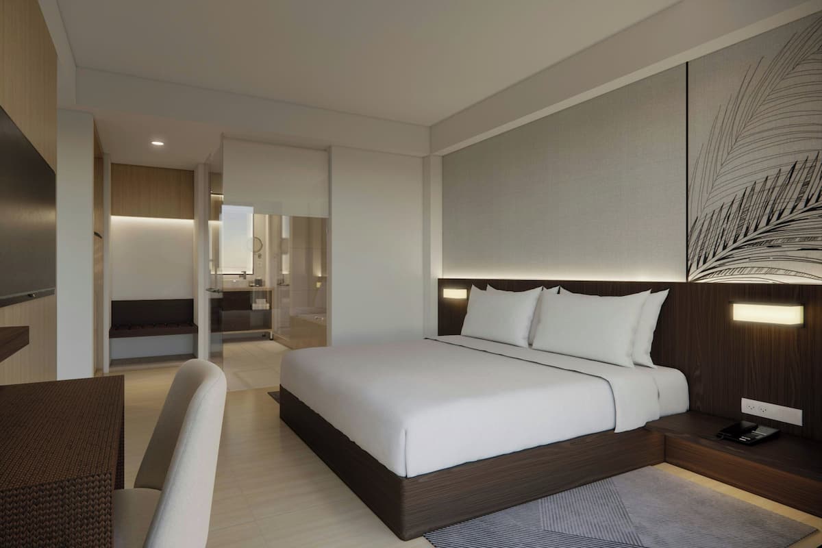 Suite, 1 King Bed, Garden View | 1 bedroom, minibar, in-room safe, desk