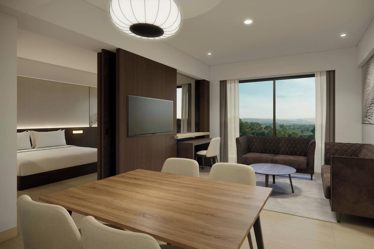 Presidential Suite, 1 King Bed, Balcony, Garden View | Living room | 29-inch LCD TV with satellite channels, TV, fireplace