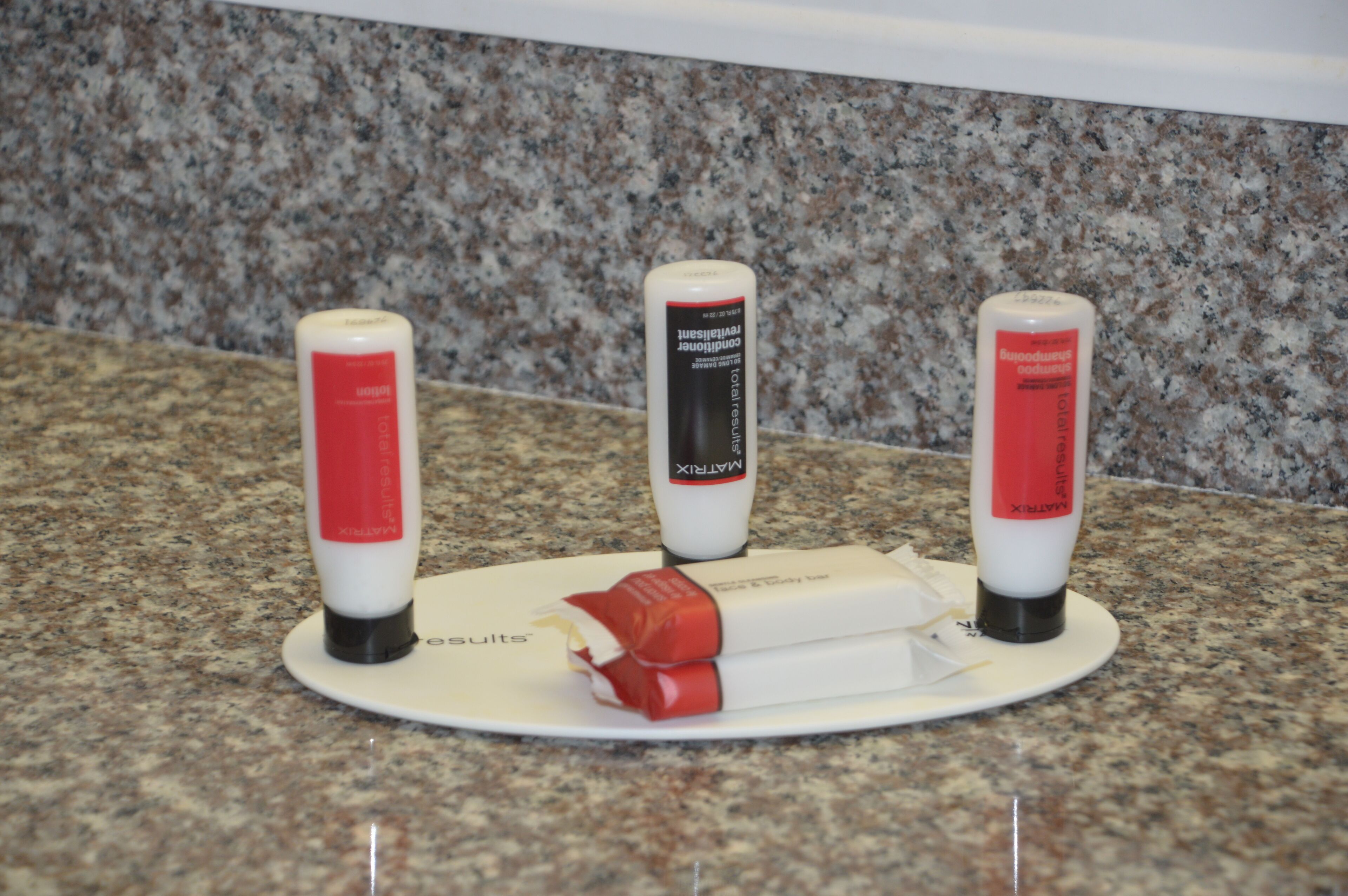 Three bottles of MasterMix on a granite countertop.