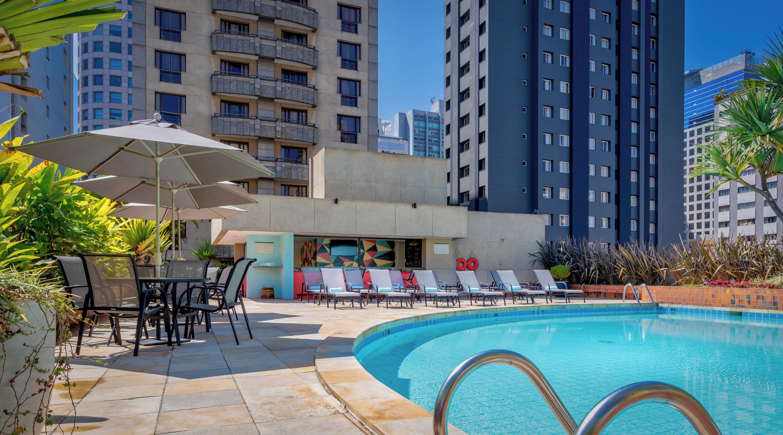 Outdoor pool, open 9:00 AM to 5:00 PM, pool loungers