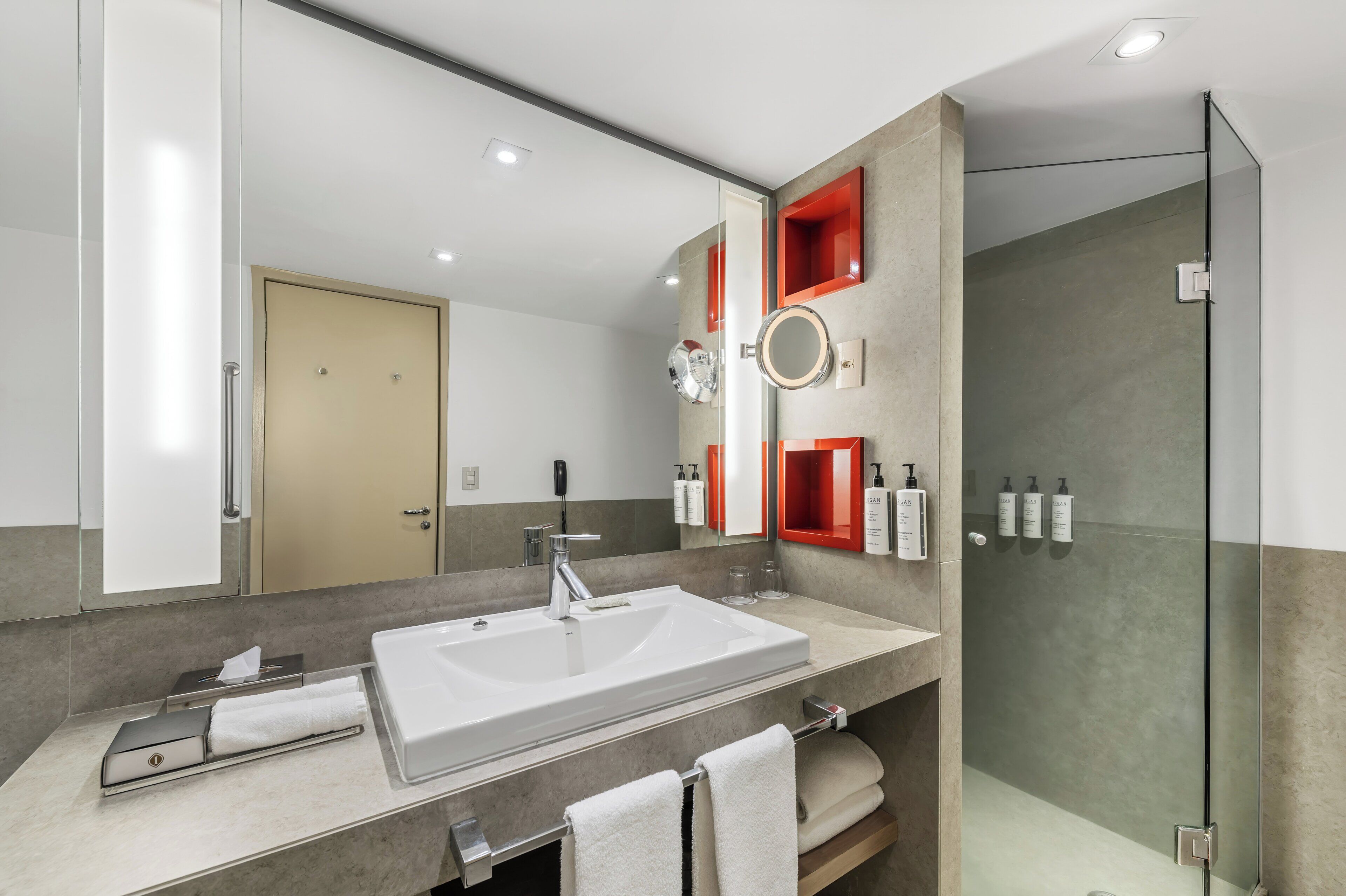 Designer toiletries, hair dryer, bathrobes, slippers