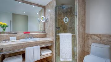Designer toiletries, hair dryer, bathrobes, slippers