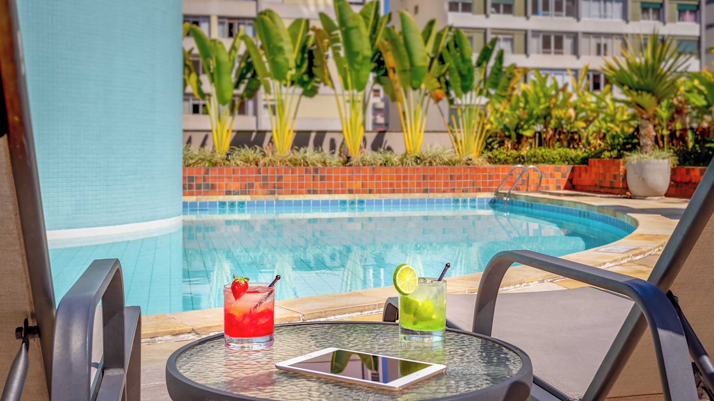 outdoor pool, open 9:00 am to 5:00 pm, pool loungers