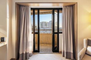 Premium bedding, pillow-top beds, minibar, in-room safe