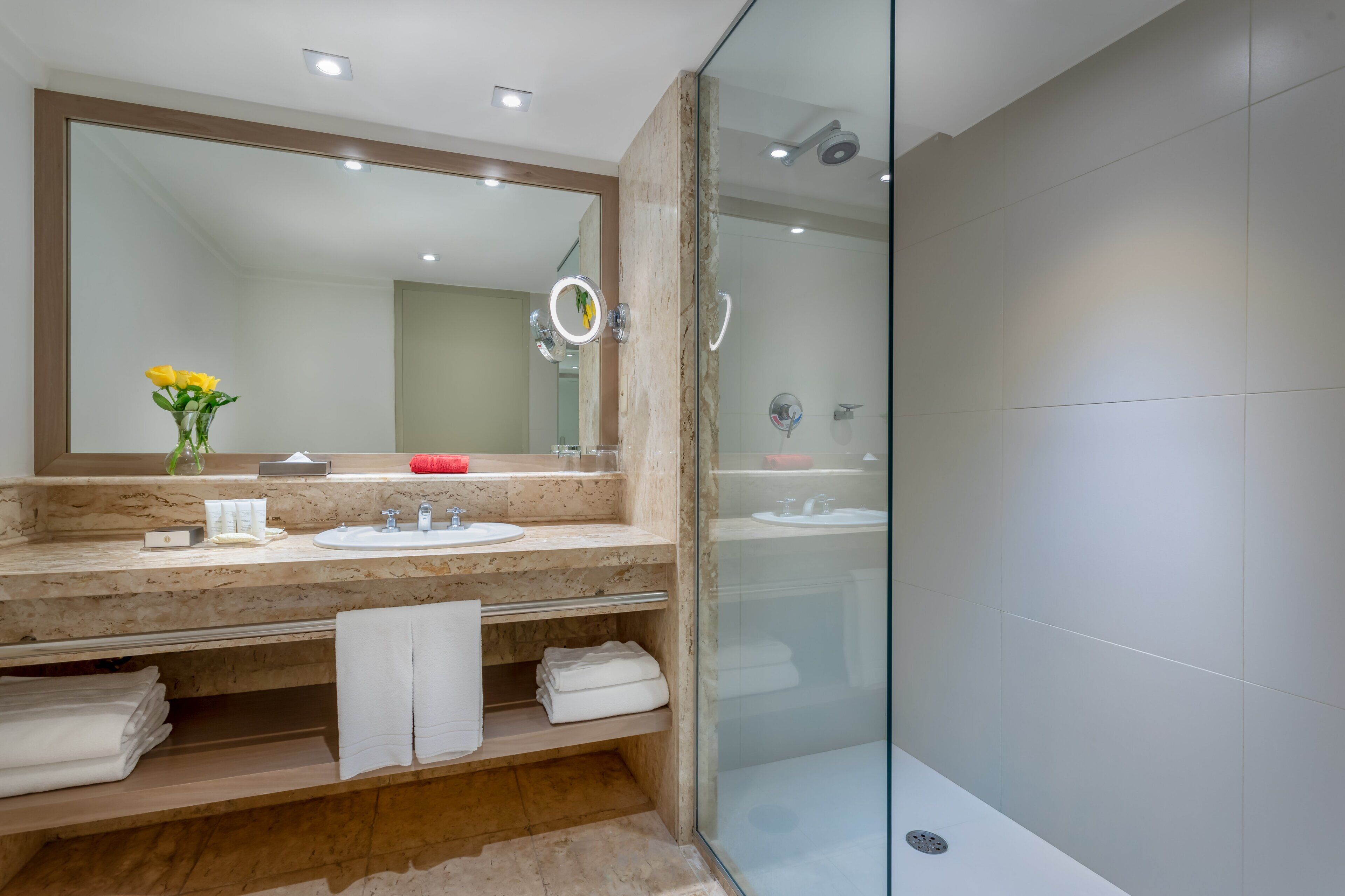 Designer toiletries, hair dryer, bathrobes, slippers