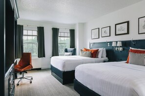 Premium bedding, pillow-top beds, desk, laptop workspace