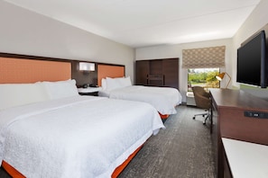 Standard room with two double beds | Premium bedding, desk, laptop workspace, blackout drapes