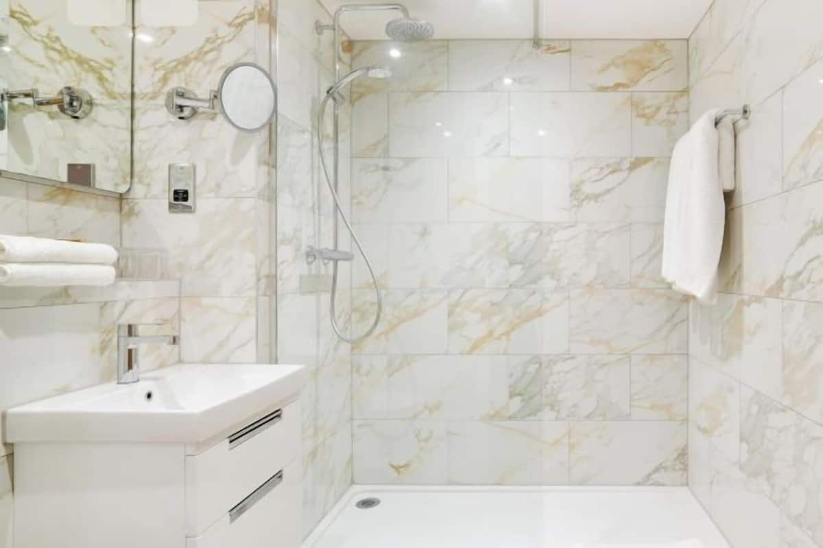 Bathroom | Shower, free toiletries, hair dryer, slippers