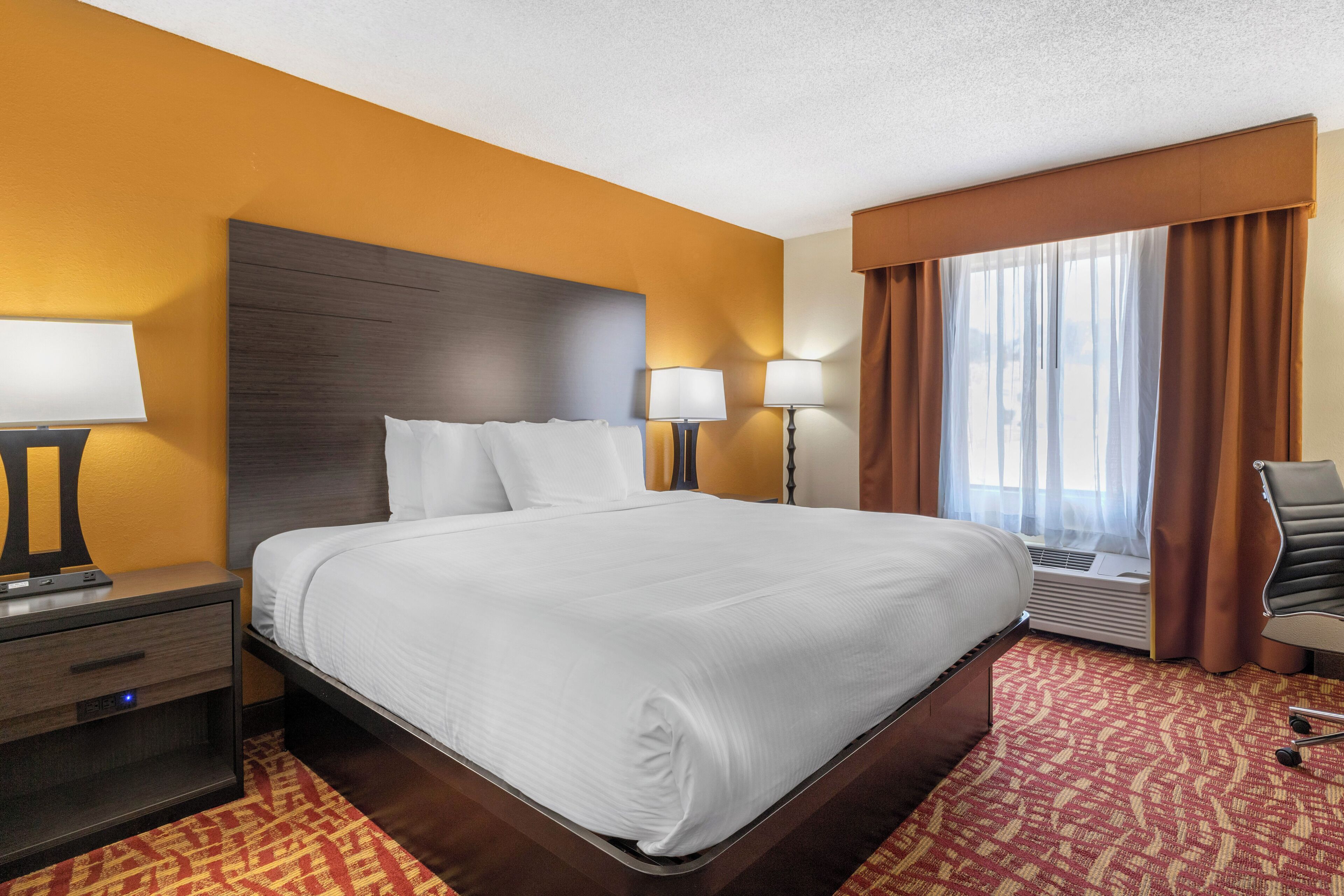 Suite, 1 King Bed, Non Smoking, Jetted Tub | Pillow-top beds, desk, laptop workspace, blackout curtains