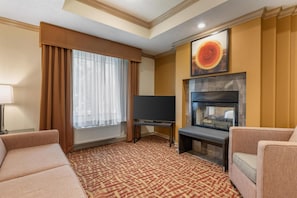 Suite, 1 King Bed, Non Smoking, Jetted Tub | Pillow-top beds, desk, laptop workspace, blackout curtains