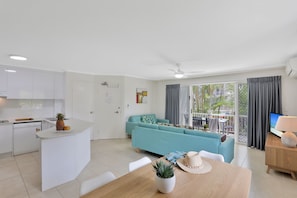 2 Bedroom Apartment | Living area | 40-inch flat-screen TV with cable channels, LCD TV