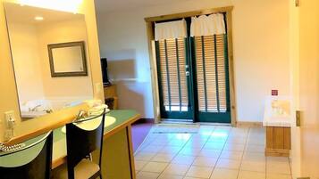 Honeymoon Suite | Living area | TV