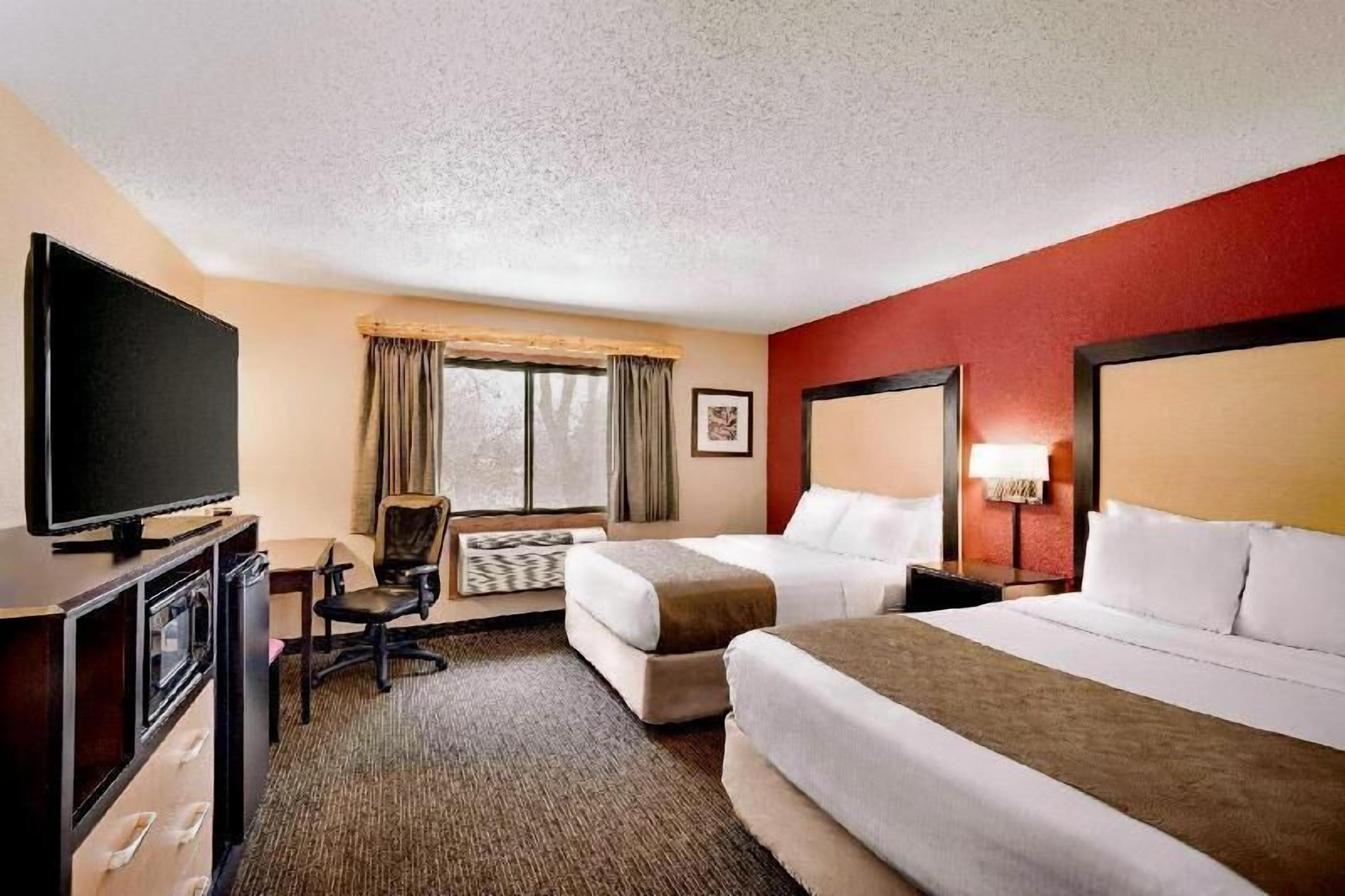 Desk, iron/ironing board, free cots/infant beds, rollaway beds