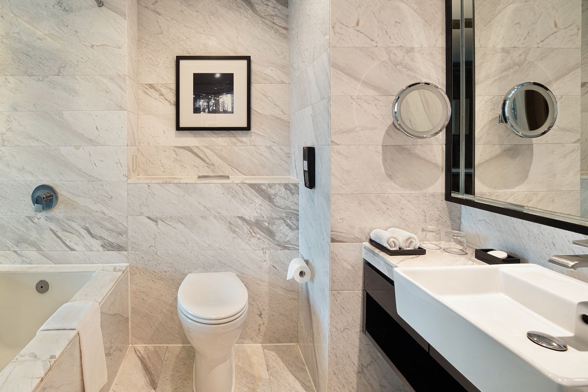 combined shower/bathtub, deep-soaking bathtub, rainfall showerhead