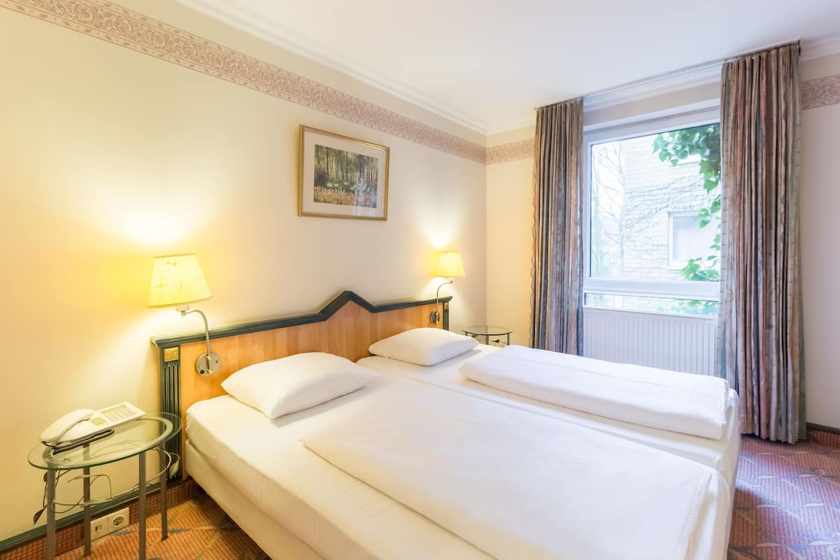 Standard Double Room | 1 bedroom, hypo-allergenic bedding available, minibar, in-room safe